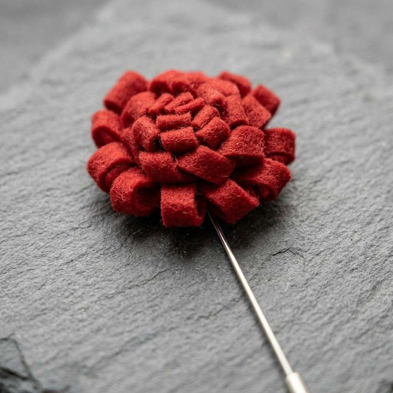 Elegant Red Floral Lapel Pin with Metallic Center