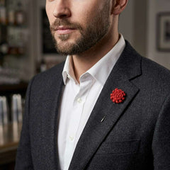 Elegant Red Floral Lapel Pin with Metallic Center